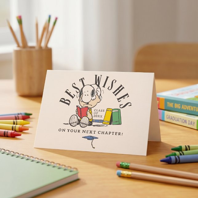 Cartão Peanuts Best Wishes Graduation Snoopy Reading (Criador carregado)