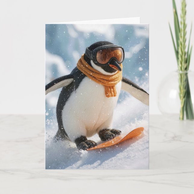 Cartão Pinguim de Natal descendo a ladeira de snowboard (Frente)