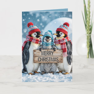 Cartão Pinguins da família natalícia com um Sinal de Made