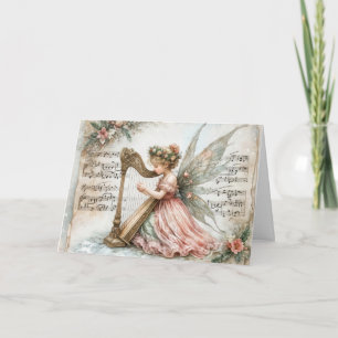Cartão Pixie Fairy de Natal tocando harpa