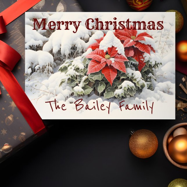 Cartão Poinsettia Feliz Natal (A Christmas card depicting red poinsettias in the snow is shown with a present and decorations.)