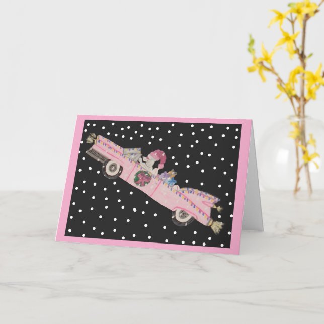 Cartão Poodle no Natal em um conversível rosa (Flor Amarela)
