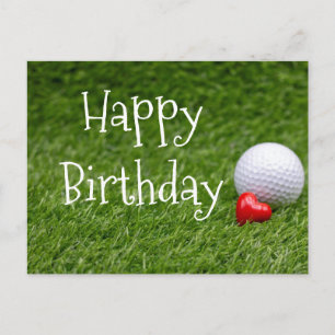 Cartão Postal A bola de golfe com coração está na grama verde