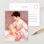 Cartão Postal Baby John Being Nursed | Mary Cassatt<br><div class="desc">Baby John Being Nursed (1910) pela artista impressionista americana Mary Cassatt. O retrato original de arte retrata uma mãe vestida de bebê rosa amamentando seu bebê. Use as ferramentas de design para adicionar texto personalizado ou personalizar a imagem.</div>