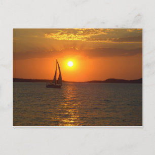 Cartão Postal Barco de navigação do por do sol