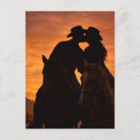 Casal do Pôr do Sol de Cowboy Cartão-postal