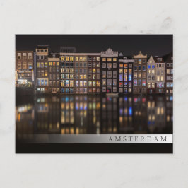 Cartão Postal Casas de Amsterdã com luzes coloridas durante a no