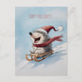 Cartão Postal Cheerful hedgehog rides sled down, Christmas