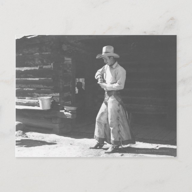 Cartão Postal Cowboy comendo de uma lata de amendoim Peter Pan. (Frente)