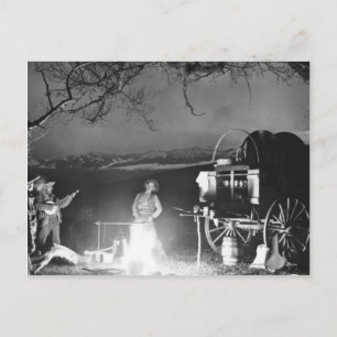 Cartão Postal Cowboys tocando e cantando ao redor de uma fogueir