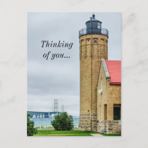 Cartão postal da ponte e farol de Mackinac