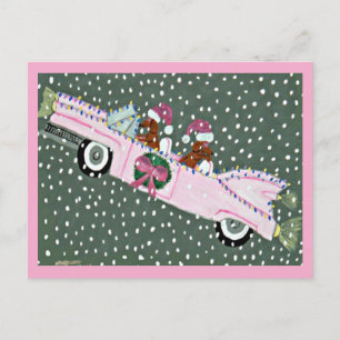 Cartão Postal Dachshunds no Natal em um conversível rosa