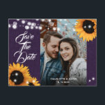 Cartão Postal De Anúncio Sunflower Purple Wedding Photo Save The Date<br><div class="desc">Rustic purple and sunflower wedding photo save the date postcard featuring sunflowers and string lights on a burlap background. Ideal card design for inviting your guest to your purple rustic country,  garden or barn wedding party inspired by sunflower flowers.</div>