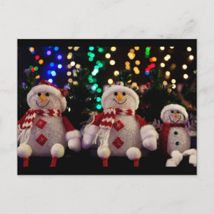 Cartão postal de feriado da família de papais noei