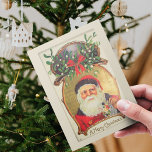 Cartão Postal De Festividades Antigo Retrato de Natal Santa Claus Amela<br><div class="desc">Este Vintage, antigo e fascinado filme Retro Natal Papai Noel com Amela e Frame em Beige, Green e Red Color Holiday Postcard com antigas letras de digitação "Um Feliz Natal" será perfeito para suas ideias de presente nesta temporada de cartões de natal. No verso, você pode personalizar desejos com seu...</div>