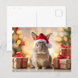 Cartão Postal De Festividades Coelho Natal sentado com um chapéu de Papai Noel