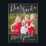 Cartão Postal De Festividades Dear Santa Define Good Fun Christmas Photo<br><div class="desc">White Hand Lettered Script on a black chalkboard background "Dear Santa Define Good" Fun Christmas Photo Holiday Card by Elke Clarke ©</div>