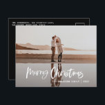 Cartão Postal De Festividades Foto preta mínima moderna de orçamento Natal<br><div class="desc">Orçamento Feliz Natal moderno 1 foto de cartão de Natal. Design de Natal preto e branco moderno. Script de texto com uma borda moderna. Mão pintada de bolinhas escondido. Altere a cor do backer para personalizar.</div>