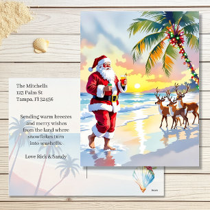 Cartão Postal De Festividades Natal em aquarela com Papai Noel e Rena na Praia