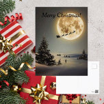 Cartão Postal De Festividades Papais noeis De Vintage Sob Rena Voadora De Lua Co<br><div class="desc">Este é um velho cartão de Natal da década de 1960, feito de novo através da magia de Zazzle. O cartão mostra Papais noeis e sua rena debaixo de uma lua de cheio. O enorme pinheiro e solitário na cena, deixa um com um sentimento de maravilha e encantamento da época...</div>