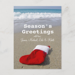 Cartão Postal De Festividades Peúga de Papai Noel que coloca na praia bonita
