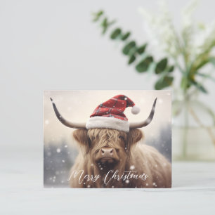 Cartão Postal De Festividades Vaca de Natal feliz em um orçamento de Papai Noel