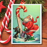 Cartão Postal De Festividades Vintage Santa Claus Pintando Uma Canela De Doces<br><div class="desc">Vintage Papais noeis pintando uma ilustração de cana doce.</div>