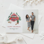 Cartão Postal De Festividades Watercolor Red Winter Cottage Woodland Photo<br><div class="desc">Feliz Feriados! Envie desejos calorosos com este postal de Natal com uma cabana vermelha de neve, árvores verdes e coelhos doces de floresta. A ilustração da aquarela adiciona um encanto rústico e aconchegante que se encaixa perfeitamente com sua foto pessoal. Personalize a mensagem e carregue sua imagem para criar uma...</div>