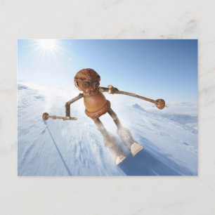 Cartão postal de inverno com elfo de bolota esquia