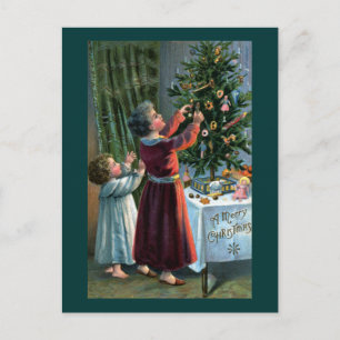 Cartão Postal Decorando a Árvore de Natal de Mesa
