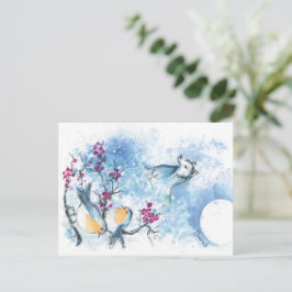 Cartão postal do lobo da neve e do robin