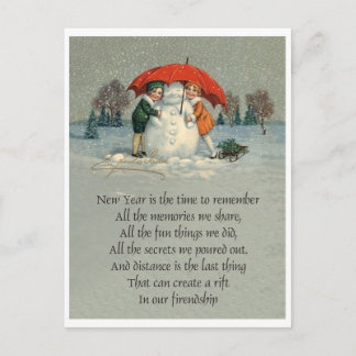 Cartão Postal Duas meninas junto com boneco de neve sob guarda-c