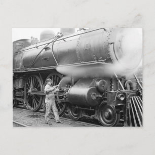 Cartão Postal Engenheiro lubrificando locomotiva, 1904