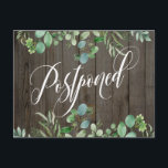 Cartão Postal Eucalyptus & Rustic Wood Adiou Casamento<br><div class="desc">A frente apresenta um gráfico que apresenta uma bela fonte de script girando que lê "Adiado". Acentuado com as disposições de borda de eucalipto com aquarela que sobrepõem as imagens da parede de madeira marrom, todas as camadas foram adicionadas separadamente e deixadas desbloqueadas para lhe dar o máximo controle de...</div>