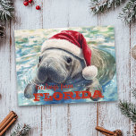 Cartão Postal Flórida Manatee Watercolor Natal<br><div class="desc">Este design pode ser personalizado na área fornecida pela alteração da foto e/ou do texto. Ou pode ser personalizado clicando em Personalizar este Modelo e, em seguida, escolhendo o clique para personalizar mais a opção e excluir ou alterar a cor do plano de fundo, adicionar texto, alterar a cor ou...</div>