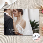 Cartão Postal Foto De Casamento Elegante Simples Obrigado<br><div class="desc">Obrigado de casamento, seus cartões postais em um simples e elegante design de duas fotos. Adicione sua foto à frente e sua mensagem e uma segunda foto ao fundo. Observe que a foto na parte traseira tem um filtro opaco sobre ela, para que pareça mais leve para que o texto...</div>