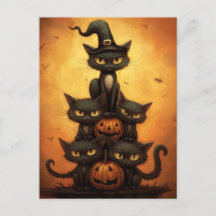 Gatos Pretos do Halloween Sentados em Pumpkins.