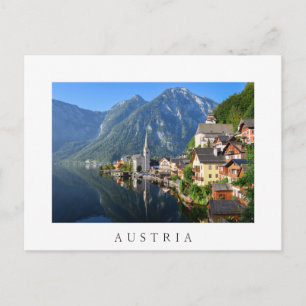Cartão Postal Igreja e vila de Hallstatt, Áustria com Alpes