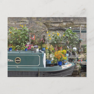 Cartão Postal Jardim de flores e barco estreito