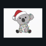 Cartão Postal Koala Christmas Snow Winter Animais Koalas<br><div class="desc">O Koala para o Natal com luzes de fadas. Animais engraçados com presentes e neve até as férias. Também é engraçado para o Natal em julho. Os coalas são animais doces e perfeitos para o Natal.</div>
