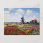 Cartão Postal Monet Field of Tulips With Windmill Postcard<br><div class="desc">Monet Field of Tulips com cartão-postal Windmill. Pintura a óleo na canvas de 1886. Uma das obras mais coloridas de Monet pintada em volta da moenda de Rijnsburg. Os campos de tulipas estão a rebentar com vermelhos, brancos, amarelos e verdes. Uma bela pintura paisagística que faz um presente excelente para...</div>