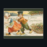 Cartão Postal Natal Vintage Menino e Menina Holandeses Com Trenó<br><div class="desc">Este belo cartão-postal apresenta uma ilustração vintage de um menino e uma menina holandeses com um trenó cheio de flores. O cartão-postal original foi carimbado em 1908.

Aproveite seu novo Cartão-Postal de Natal Vintage Menino e Menina Holandeses Com Trenó!</div>