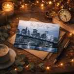 Cartão Postal NYC Unforgettable Night Skyline<br><div class="desc">NYC: unforgettable, electric, and endlessly inspiring. This striking postcard captures the unforgettable beauty of the New York City skyline glowing against the night sky. The shimmering reflections dancing across the water create a dramatic and romantic view of Manhattan that perfectly reflects the energy of the city that never sleeps. Whether...</div>