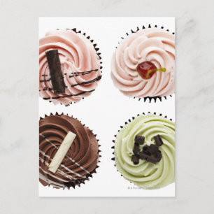 Cartão Postal Overhead view of four cup cakes on white