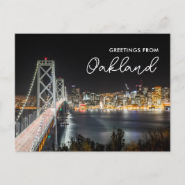 Cartão Postal Saudações da Linha do Horizonte Noturna de Oakland