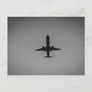 Cartão Postal Silhouetted aircraft landing