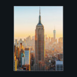 Cartão Postal Sunset Over New York<br><div class="desc">Sol se instalando sobre Nova York lançando uma luz de ouro sobre a cidade.</div>