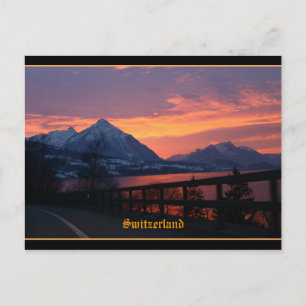 Cartão Postal Sunset sobre o lago Thun perto da Suiça Interlake