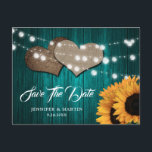 Cartão Postal Teal Sunflower Wood Lights Burlap Hearts Wedding<br><div class="desc">Teal and sunflower wedding save the date postcard featuring sunflowers,  string lights and burlap hearts against a rustic wood background.</div>