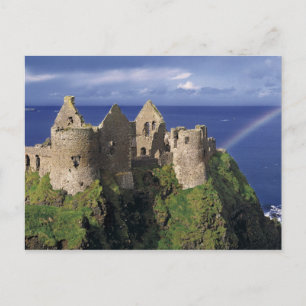 Cartão Postal Um arco-íris atinge o castelo medieval de Dunluce